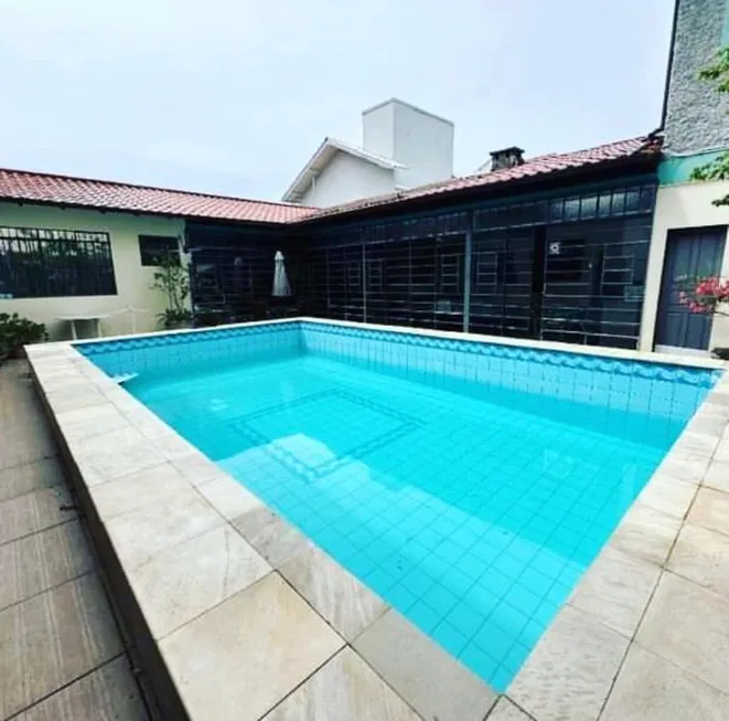 Foto 1 de Casa com 6 Quartos à venda, 343m² em Canasvieiras, Florianópolis