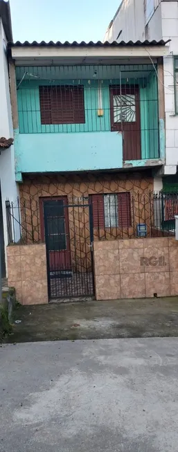 Foto 1 de Casa com 2 Quartos à venda, 80m² em Vila Nova, Porto Alegre