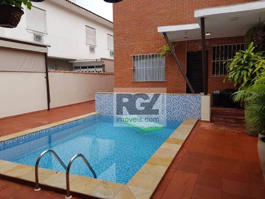 Foto 1 de Casa com 4 Quartos para venda ou aluguel, 250m² em Embaré, Santos
