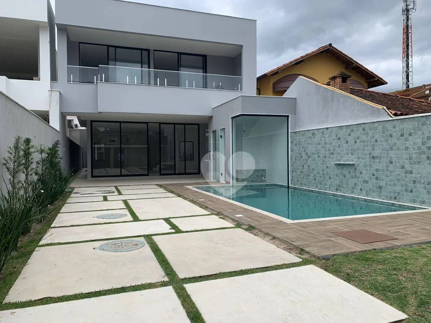 Foto 1 de Casa de Condomínio com 4 Quartos à venda, 350m² em Barra da Tijuca, Rio de Janeiro