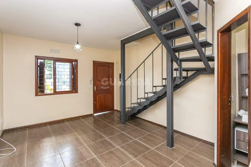 Foto 1 de Casa de Condomínio com 2 Quartos para alugar, 58m² em Ipanema, Porto Alegre