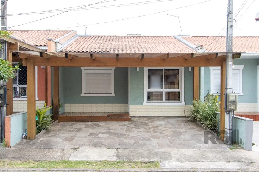 Foto 1 de Casa de Condomínio com 3 Quartos à venda, 71m² em Hípica, Porto Alegre