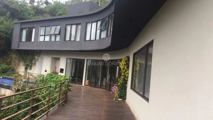 Foto 1 de Casa de Condomínio com 4 Quartos à venda, 430m² em Vila  Alpina, Nova Lima