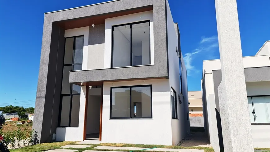 Foto 1 de Casa de Condomínio com 4 Quartos à venda, 165m² em Abrantes, Camaçari