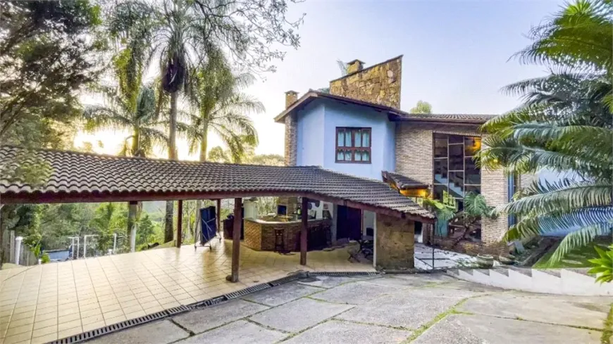 Foto 1 de Casa de Condomínio com 4 Quartos à venda, 350m² em Serra da Cantareira, Mairiporã