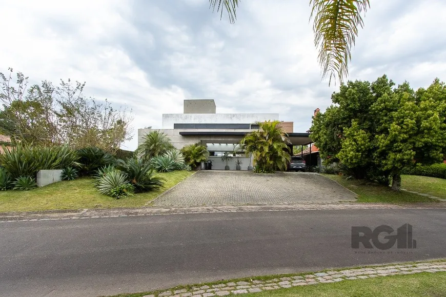 Foto 1 de Casa de Condomínio com 4 Quartos à venda, 417m² em Belém Novo, Porto Alegre