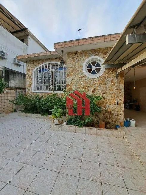 Foto 1 de Casa com 5 Quartos à venda, 170m² em Embaré, Santos