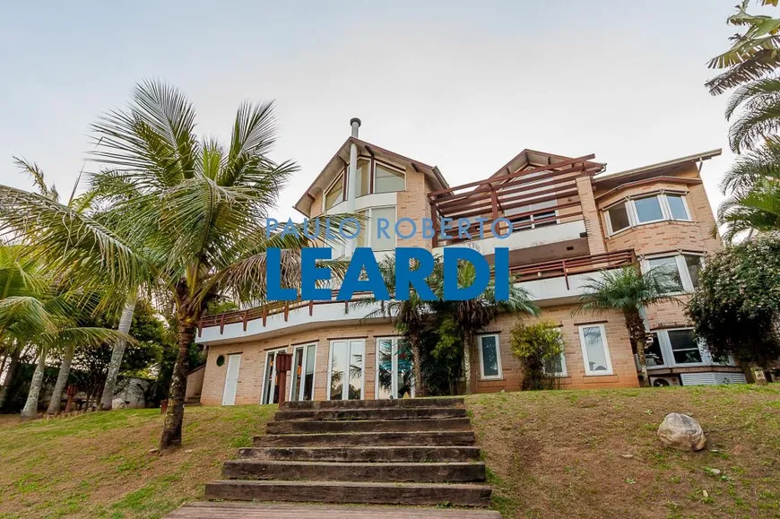 Foto 1 de Casa de Condomínio com 7 Quartos à venda, 1600m² em Alphaville, Santana de Parnaíba