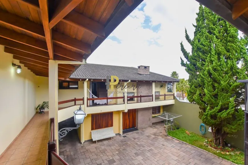 Foto 1 de Casa com 5 Quartos à venda, 480m² em Ahú, Curitiba