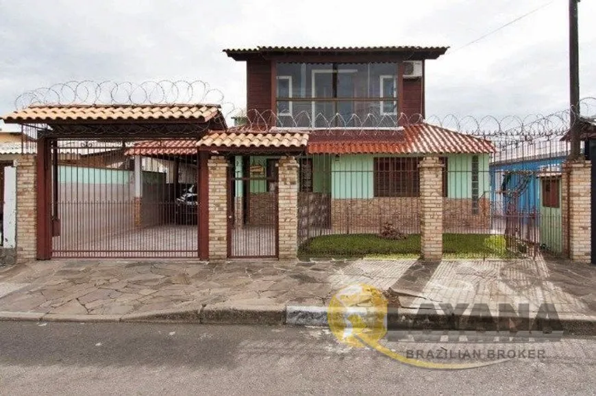 Foto 1 de Casa com 4 Quartos à venda, 224m² em Vila Nova, Porto Alegre