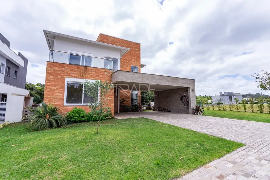 Foto 1 de Casa de Condomínio com 4 Quartos à venda, 272m² em Alphaville, Porto Alegre