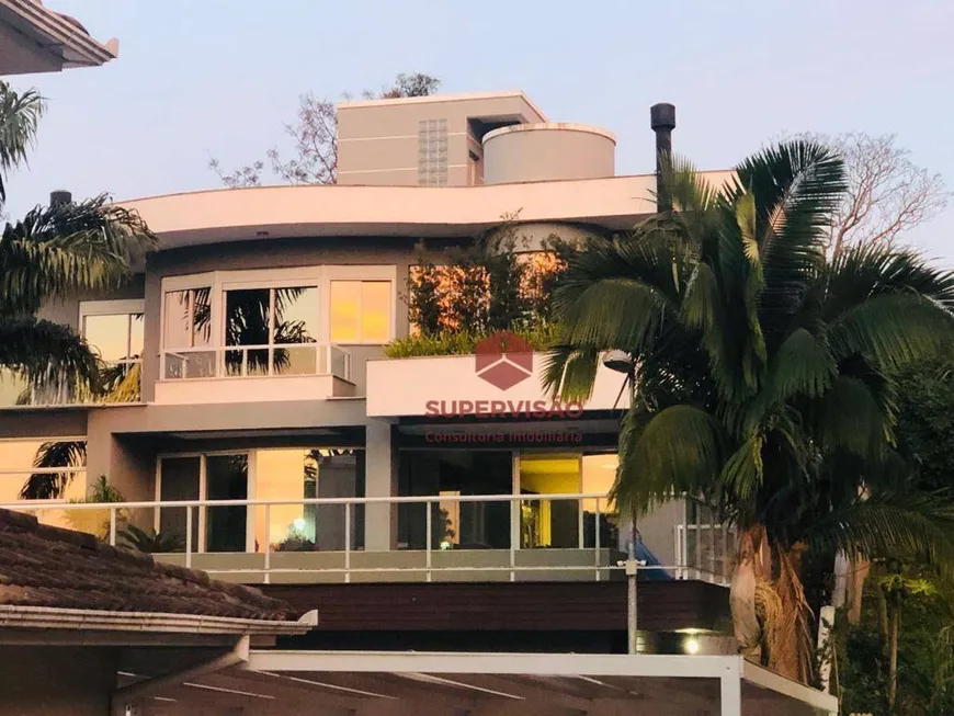 Foto 1 de Casa de Condomínio com 3 Quartos à venda, 340m² em Cacupé, Florianópolis