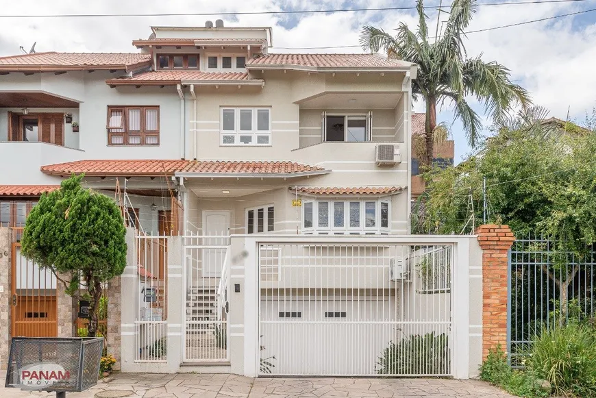 Foto 1 de Sobrado com 3 Quartos à venda, 390m² em Jardim Itú Sabará, Porto Alegre