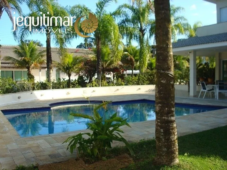 Foto 1 de Casa de Condomínio com 5 Quartos para venda ou aluguel, 360m² em Balneário Praia do Pernambuco, Guarujá