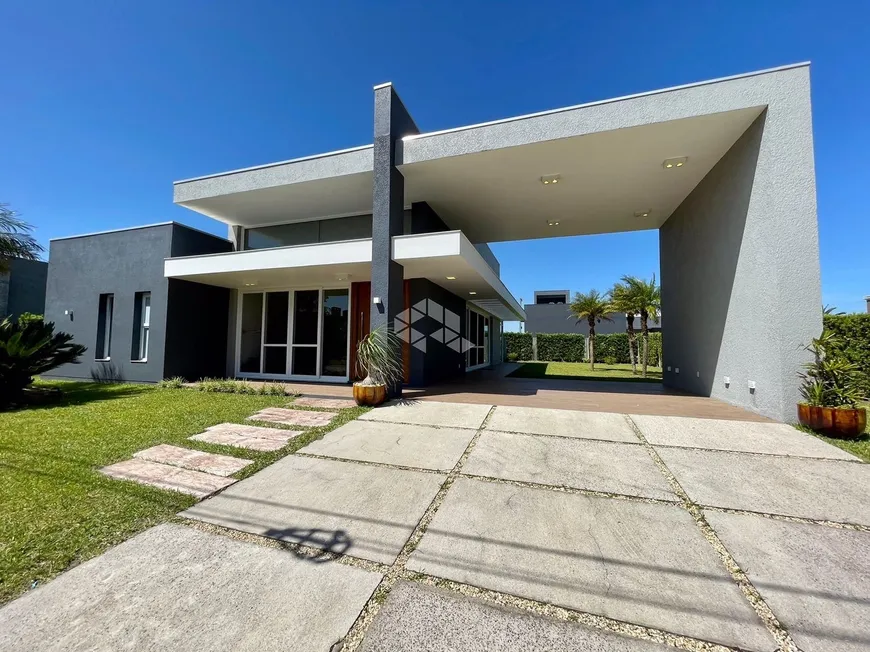 Foto 1 de Casa de Condomínio com 4 Quartos à venda, 225m² em Condominio Lagoa do Passo, Osório