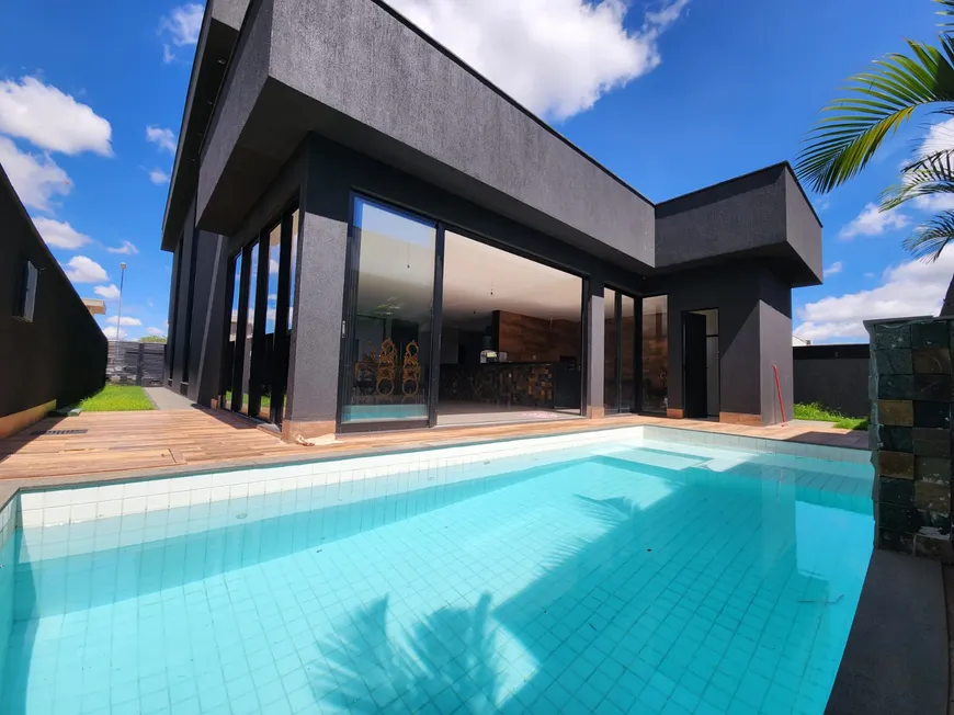 Foto 1 de Casa de Condomínio com 4 Quartos à venda, 330m² em PORTAL DO SOL GREEN, Goiânia