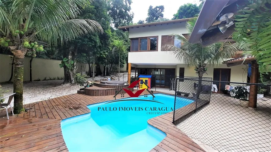 Foto 1 de Casa de Condomínio com 4 Quartos à venda, 364m² em Massaguaçu, Caraguatatuba