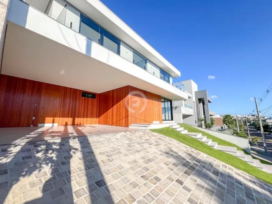 Foto 1 de Casa de Condomínio com 4 Quartos à venda, 300m² em Encosta do Sol, Estância Velha