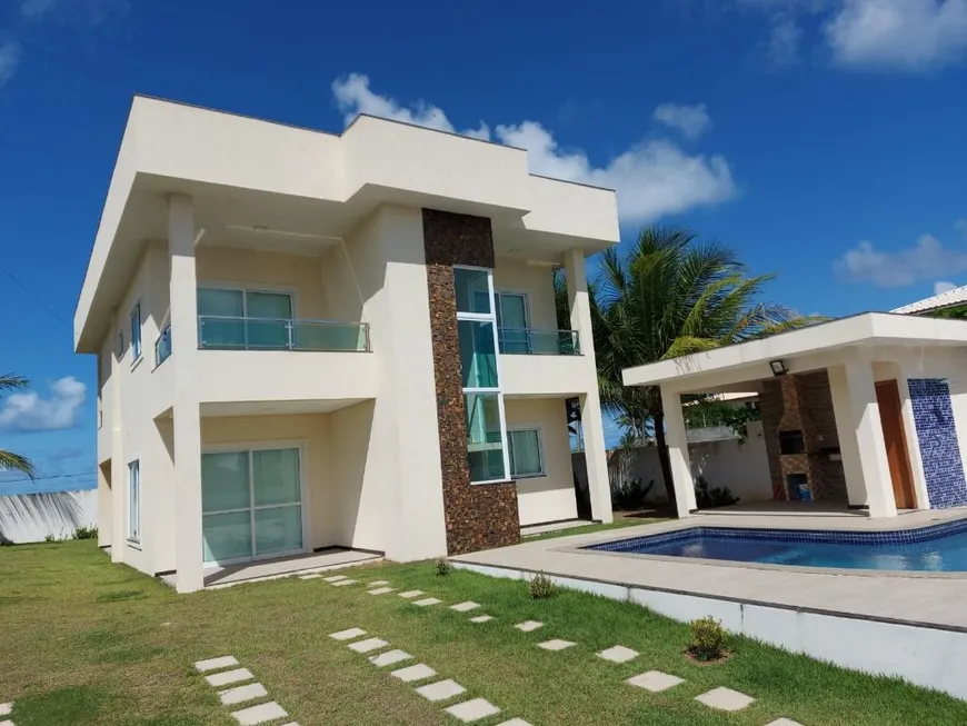 Foto 1 de Casa de Condomínio com 5 Quartos à venda, 256m² em Barra do Jacuípe, Camaçari
