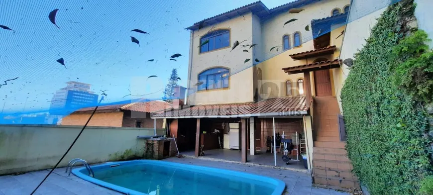 Foto 1 de Casa com 5 Quartos à venda, 360m² em Coqueiros, Florianópolis