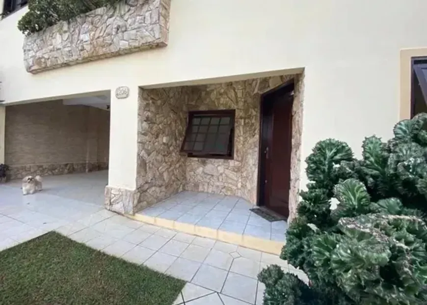 Foto 1 de Casa com 4 Quartos à venda, 195m² em Canto do Forte, Praia Grande