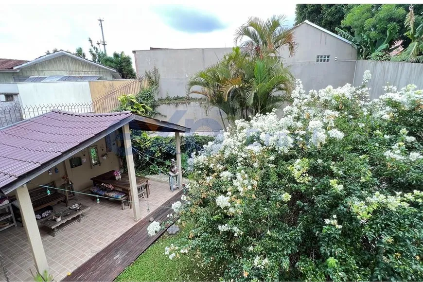 Foto 1 de Sobrado com 3 Quartos à venda, 204m² em Uberaba, Curitiba