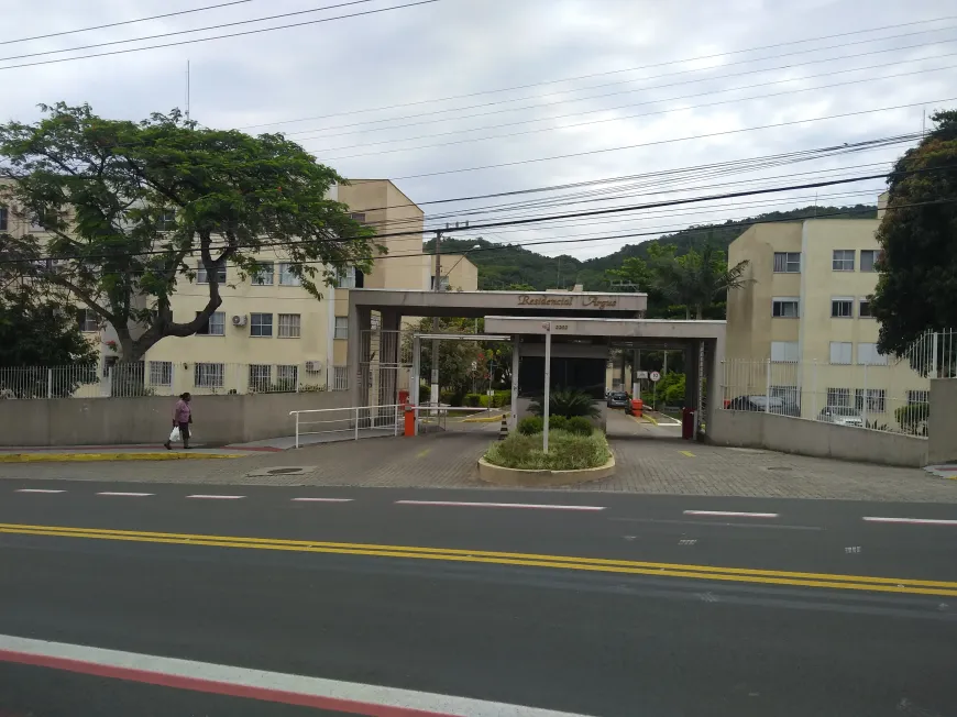 Foto 1 de Apartamento com 2 Quartos à venda, 56m² em Coqueiros, Florianópolis