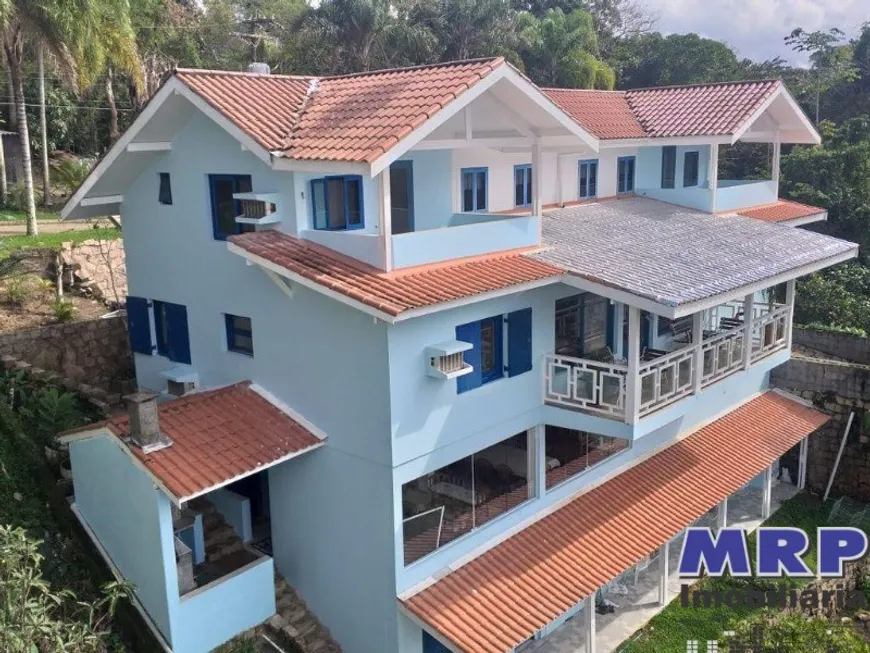 Foto 1 de Casa de Condomínio com 7 Quartos à venda, 350m² em Praia das Toninhas, Ubatuba