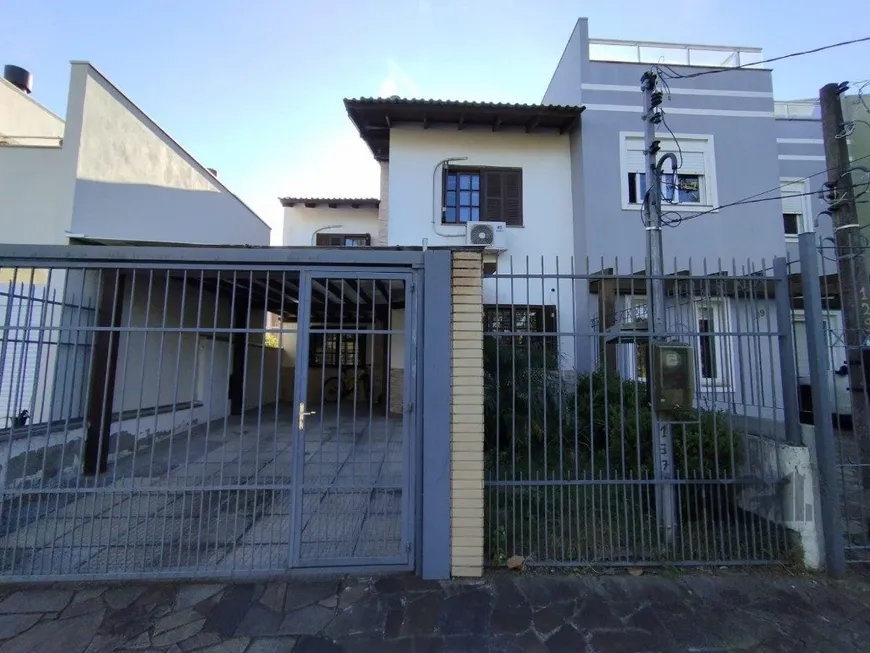 Foto 1 de Casa de Condomínio com 4 Quartos à venda, 113m² em Hípica, Porto Alegre