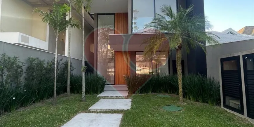 Foto 1 de Casa de Condomínio com 4 Quartos à venda, 280m² em Barra da Tijuca, Rio de Janeiro