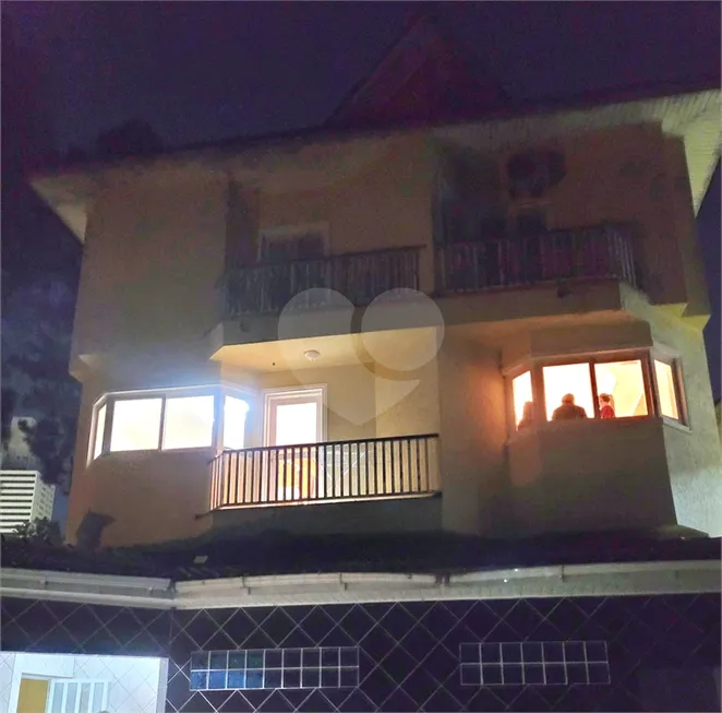 Foto 1 de Casa de Condomínio com 4 Quartos à venda, 460m² em Alphaville, Barueri