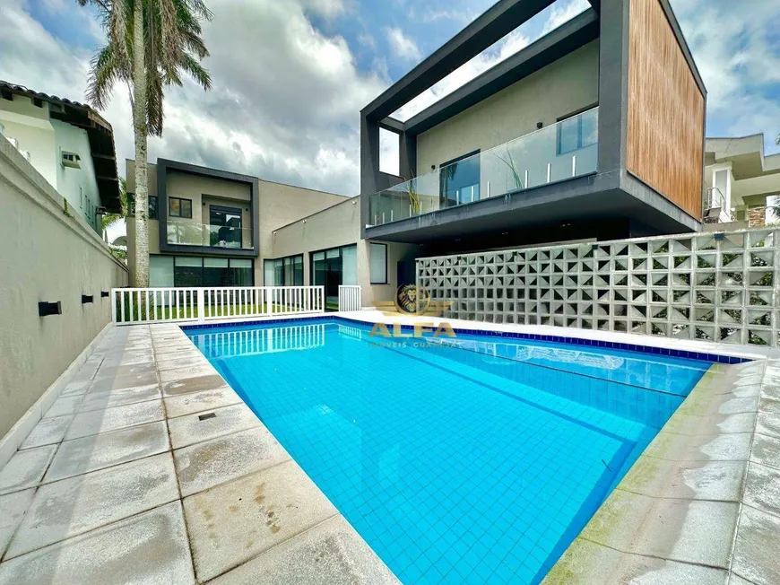 Foto 1 de Casa de Condomínio com 6 Quartos à venda, 300m² em Jardim Acapulco , Guarujá