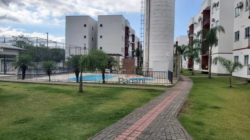 Foto 1 de Apartamento com 2 Quartos à venda, 60m² em Aririu, Palhoça