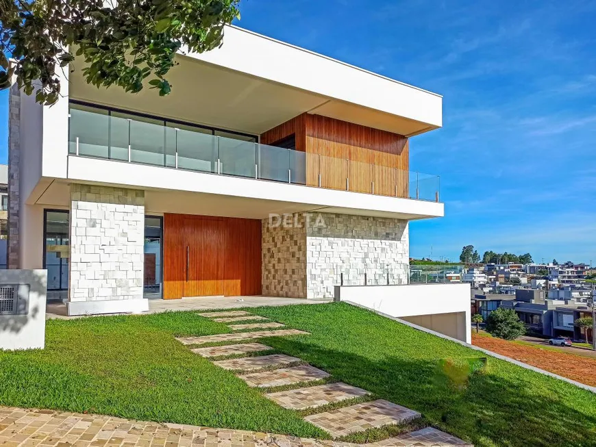 Foto 1 de Casa de Condomínio com 4 Quartos à venda, 460m² em Encosta do Sol, Estância Velha