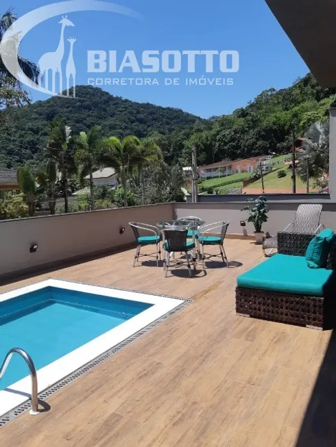 Foto 1 de Casa de Condomínio com 4 Quartos à venda, 230m² em Lagoinha, Ubatuba