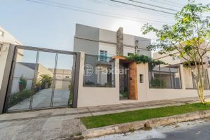 Foto 1 de Casa de Condomínio com 4 Quartos à venda, 225m² em Lomba do Pinheiro, Porto Alegre