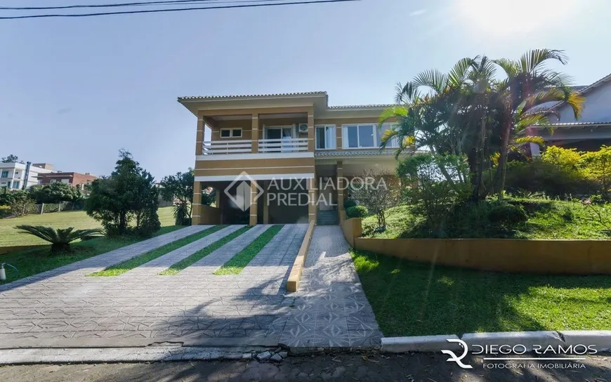 Foto 1 de Casa de Condomínio com 4 Quartos à venda, 320m² em Elsa, Viamão