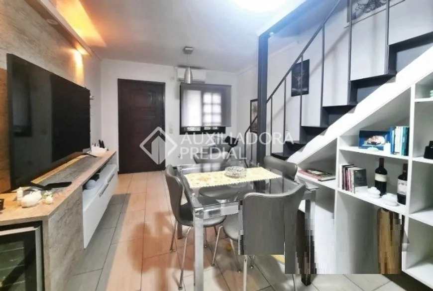 Foto 1 de Casa de Condomínio com 2 Quartos à venda, 82m² em Vila Nova, Porto Alegre