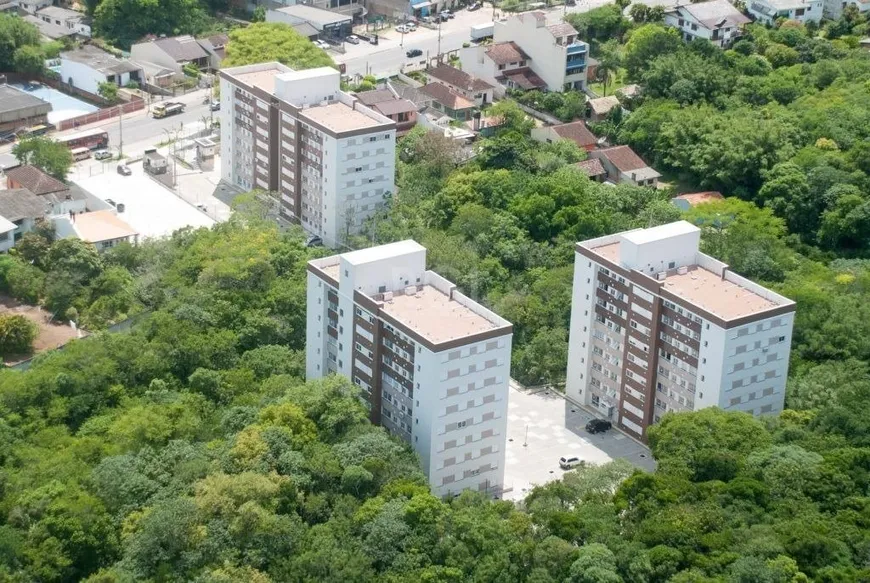 Foto 1 de Apartamento com 2 Quartos à venda, 59m² em Vila Nova, Porto Alegre