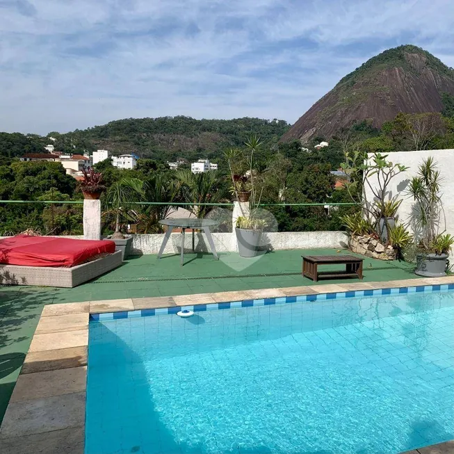 Foto 1 de Casa com 9 Quartos à venda, 600m² em Laranjeiras, Rio de Janeiro