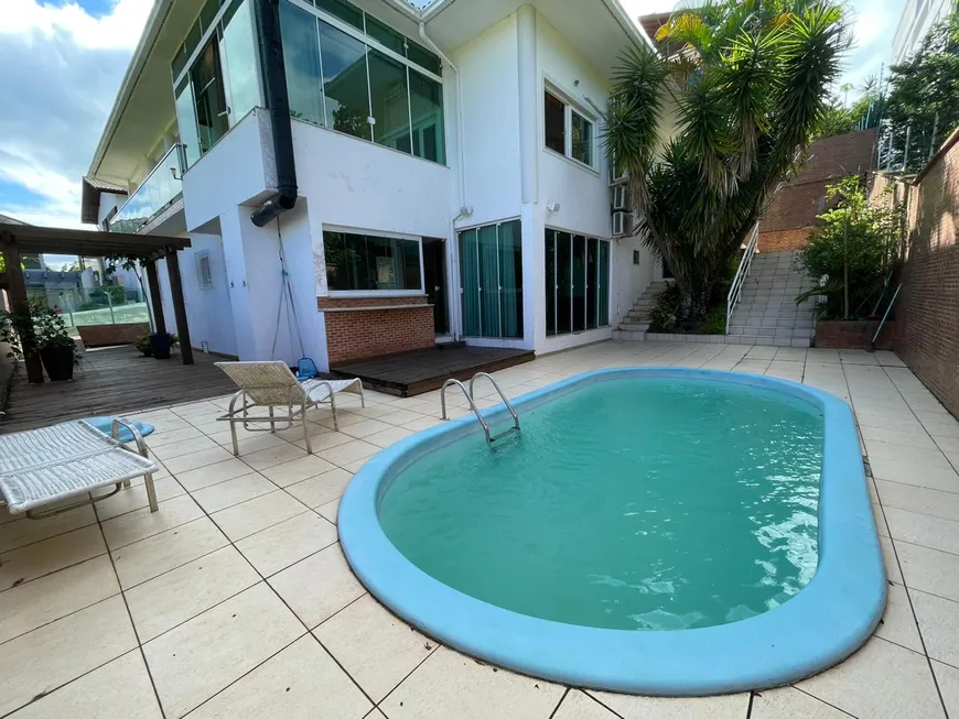 Foto 1 de Casa de Condomínio com 4 Quartos à venda, 428m² em Cacupé, Florianópolis