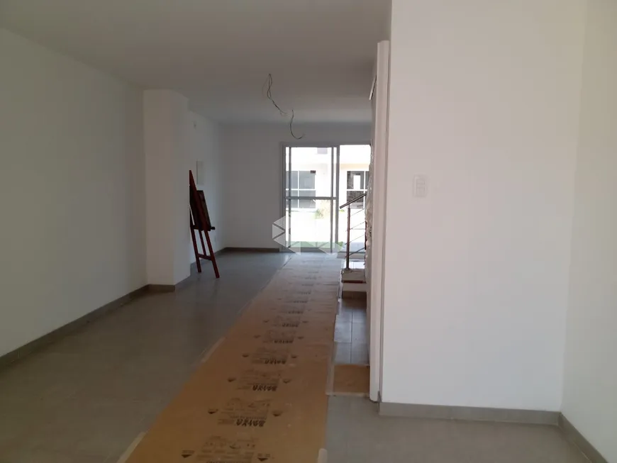 Foto 1 de Casa de Condomínio com 2 Quartos à venda, 118m² em Santa Fé, Porto Alegre