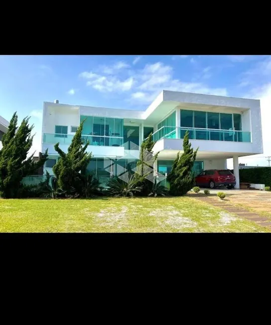 Foto 1 de Casa de Condomínio com 4 Quartos à venda, 400m² em Condominio Lagoa do Passo, Osório