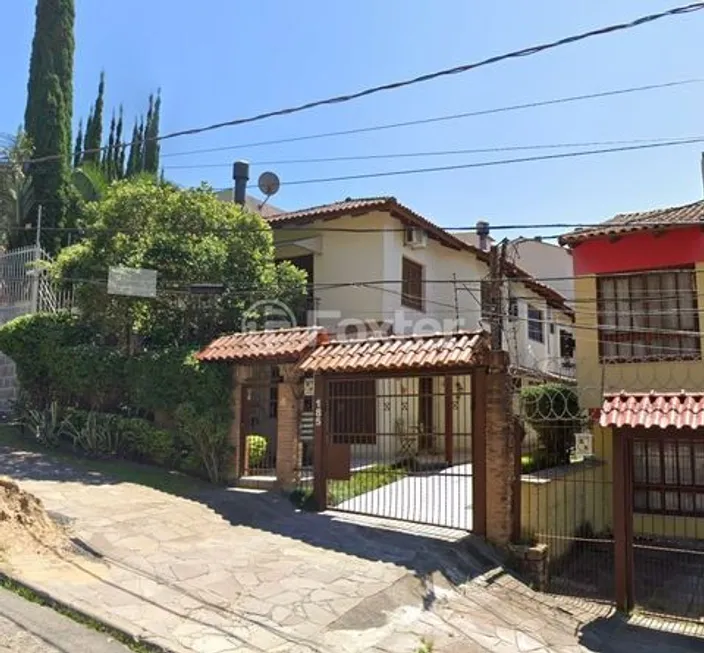 Foto 1 de Casa de Condomínio com 2 Quartos à venda, 110m² em Teresópolis, Porto Alegre