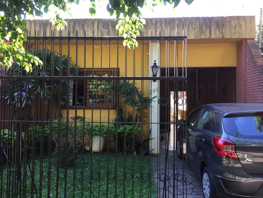 Foto 1 de Casa com 4 Quartos à venda, 171m² em Petrópolis, Porto Alegre