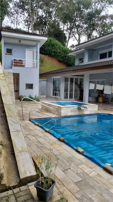 Foto 1 de Casa de Condomínio com 3 Quartos à venda, 360m² em Caraguata, Mairiporã