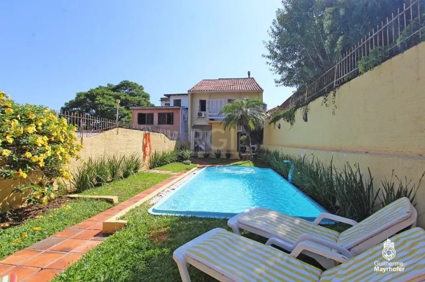 Foto 1 de Casa com 5 Quartos à venda, 241m² em Menino Deus, Porto Alegre