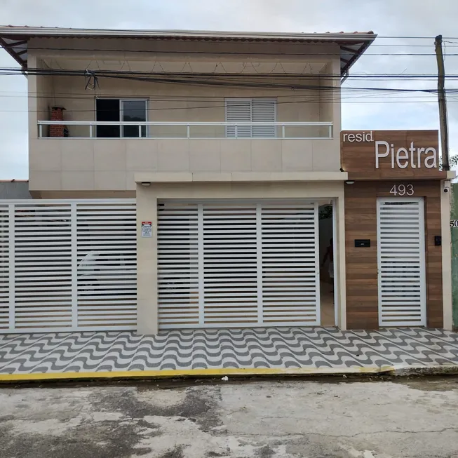 Foto 1 de Casa de Condomínio com 2 Quartos à venda, 61m² em Jardim Real, Praia Grande