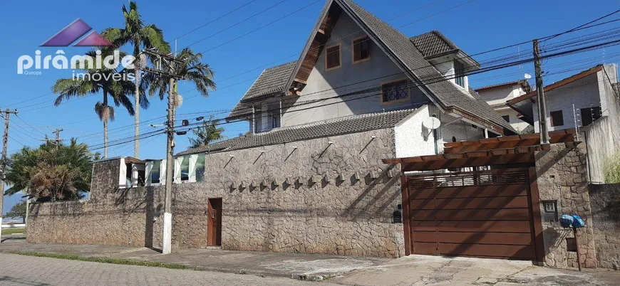 Foto 1 de Casa com 5 Quartos para venda ou aluguel, 567m² em Indaiá, Caraguatatuba
