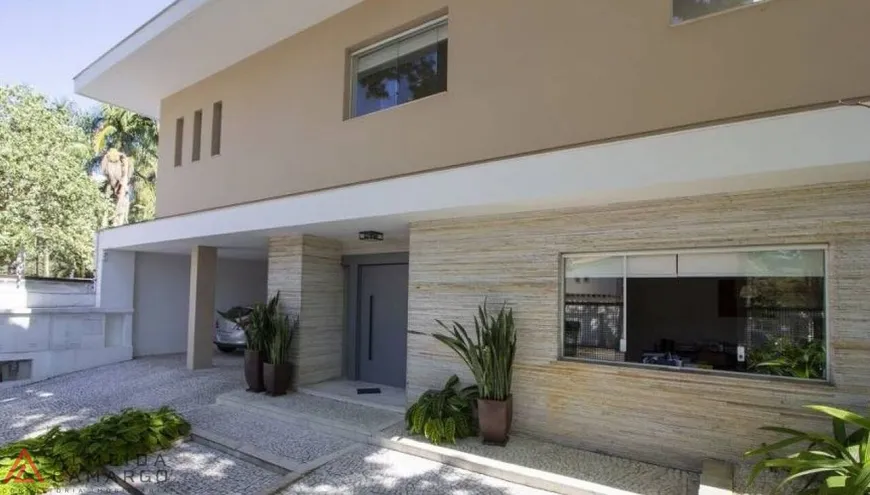 Foto 1 de Casa com 4 Quartos à venda, 574m² em Jardim Europa, São Paulo